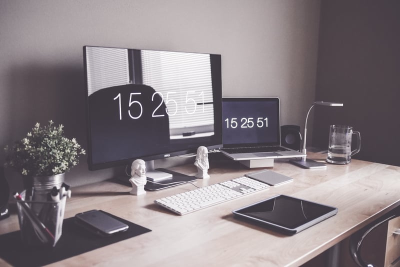 Desk with Displays Showing Time